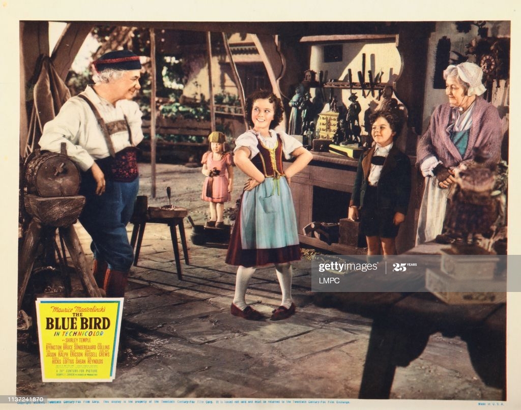 The Blue Bird, lobbycard, from left: Al Shean, Shirley Temple, Johnny Russell, Cecilia Loftus, 1940. (Photo by LMPC via Getty Images)